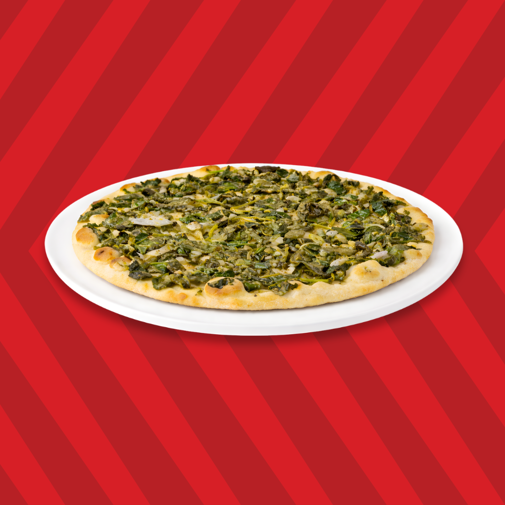 Lebanese fatayer pie baked on a flatbread crust with spinach and onion